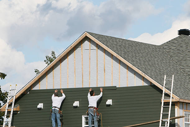 Professional Siding Contractor technician working in Middleton, MA